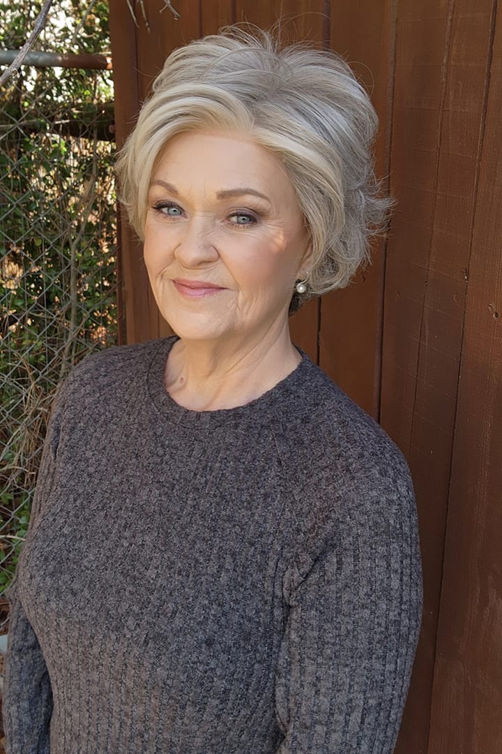 Woman wearing a cropped gray wig (Cutting Edge by Gabor in Iced Granita)