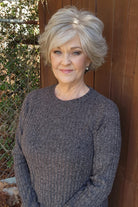 Woman wearing a cropped gray wig (Cutting Edge by Gabor in Iced Granita)
