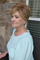 Woman wearing red pixie wig (Passion by Gabor in Light Red)