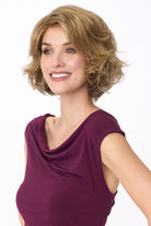 Gia Mono synthetic wavy bob wig in light brown with a natural lace front and monofilament top.