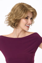 Gia Mono synthetic wavy bob wig in light brown with a natural lace front and monofilament top.