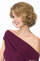 Gia Mono by Envy wavy blonde bob synthetic wig with a natural lace front and monofilament top.