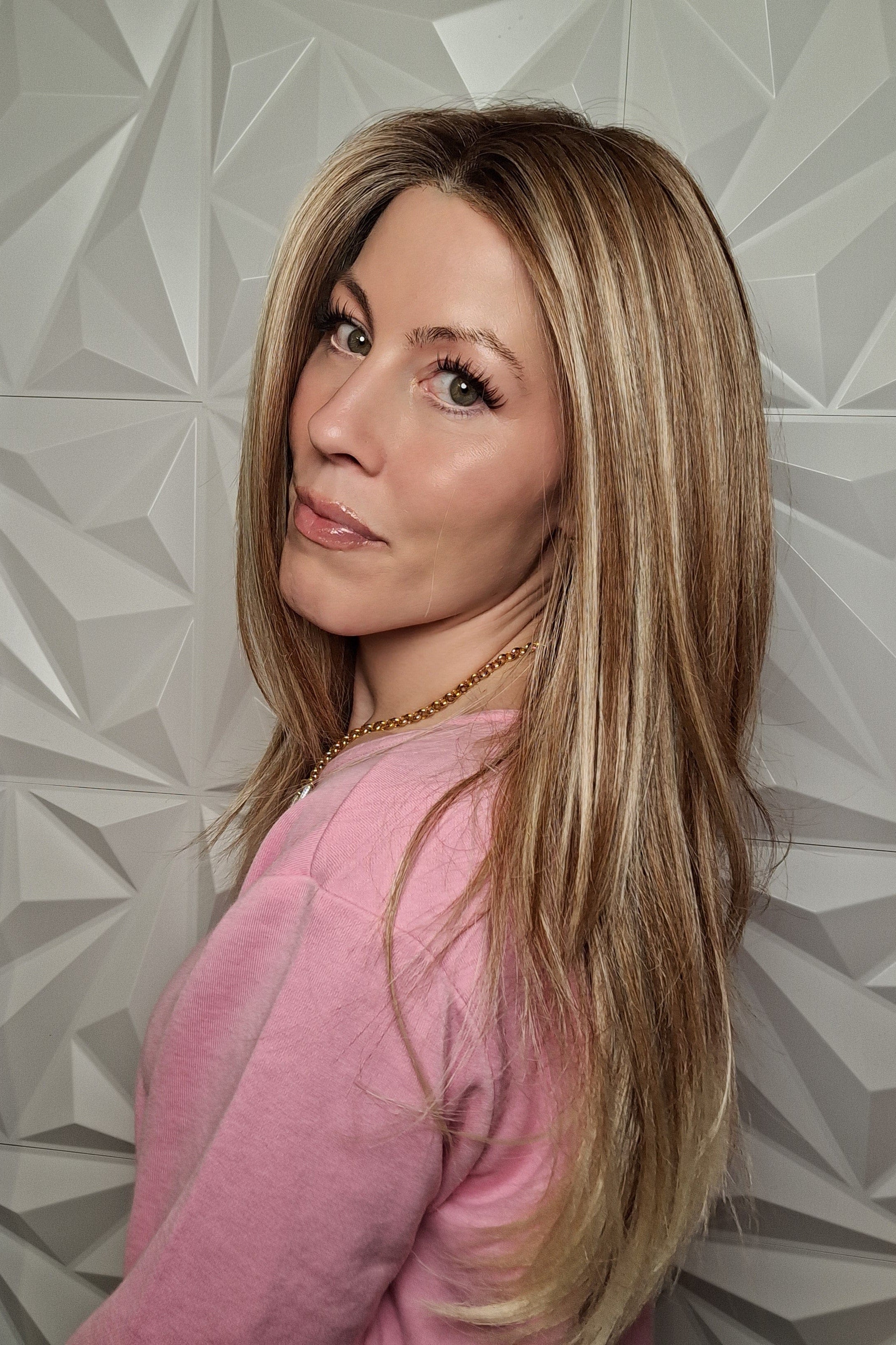 Woman wearing long layered wig (Henry Margu's Milan in color 88GR) side