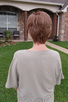 Woman wearing short auburn pixie wig (Pebbles by Henry Margu in 8/27/26HR)