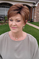 Woman wearing short auburn pixie wig (Pebbles by Henry Margu in 8/27/26HR)