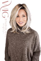Woman wearing layered blonde rooted shoulder length wig (Henry Margu's London in 26GR)