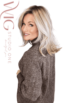 Woman wearing layered blonde rooted shoulder length wig (Henry Margu's London in 26GR)
