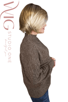 Woman wearing rooted blonde chin-length bob style (Jon Renau's Ava in 12SF8) side