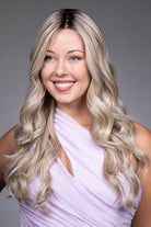 Karenina by Belle Tress long blonde wavy synthetic wig with a lace front and monofilament top.