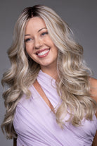 Karenina by Belle Tress long blonde wavy synthetic lace front wig with a natural monofilament top.