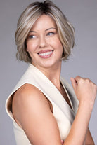 Woman is wearing Kate wig by Belle Tress in Butterbeer R | Front