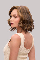 Lacy Lite by Jon Renau shoulder-length wavy lob wig with a natural lace front in a highlighted brown shade.