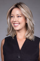 Woman wearing Monaco wig by Belle Tress in Milkshake Blonde R | Side