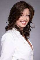 Woman wearing Munich wig by Belle Tress in Mocha Maple Brown | Side smiling