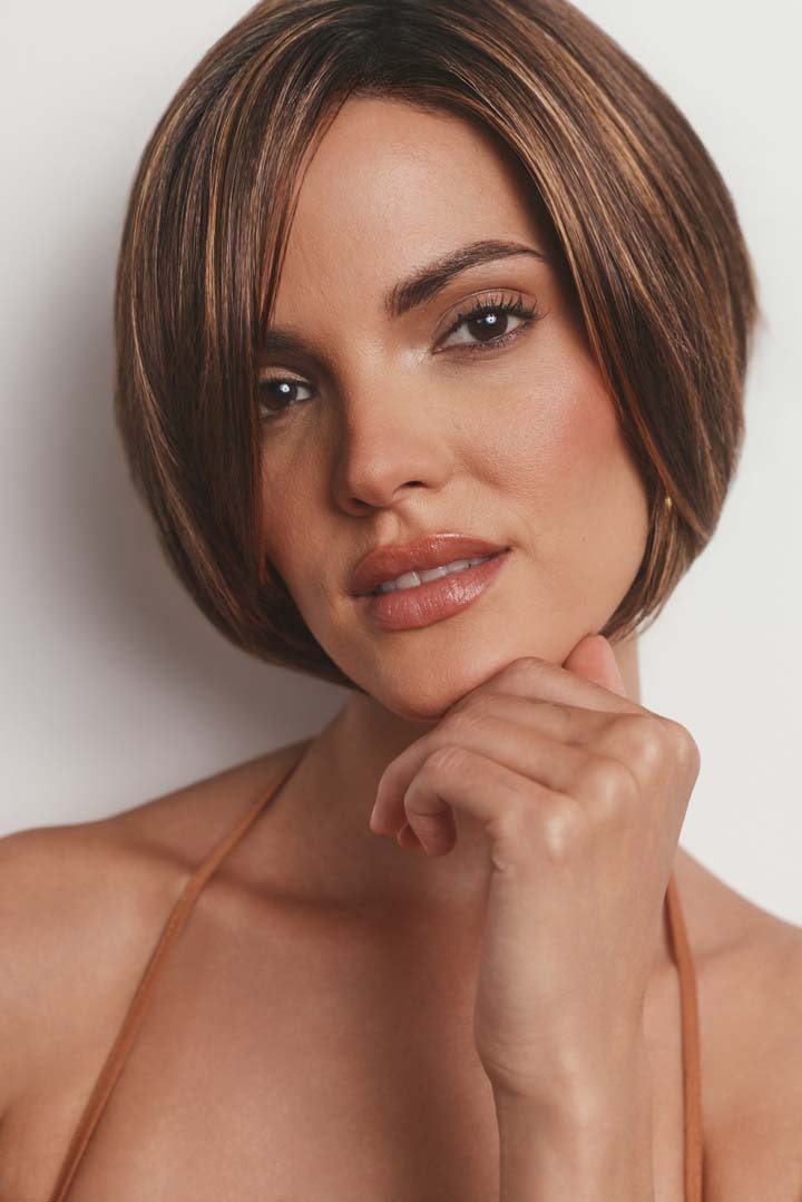 Maggie synthetic lace front bob wig in a highlighted brown shade with textured layers and a natural hairline.