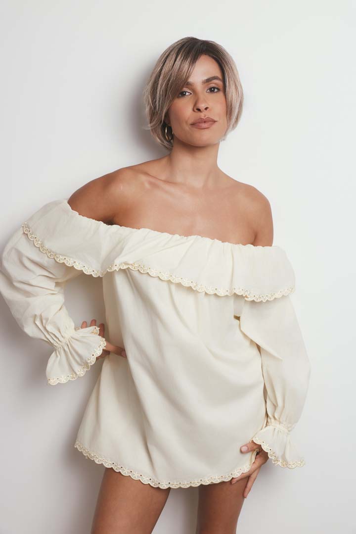 Maggie synthetic lace front wig in a tousled, short-to-medium length bob with natural movement and a tapered nape.