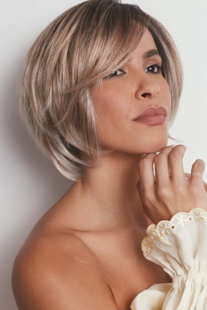 Maggie synthetic lace front bob wig in a highlighted ash blonde shade with tousled, shattered layers.