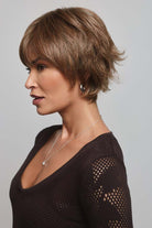 Mio by Noriko short layered brown pixie wig with a lace front and soft fringe, shown from a side profile view.