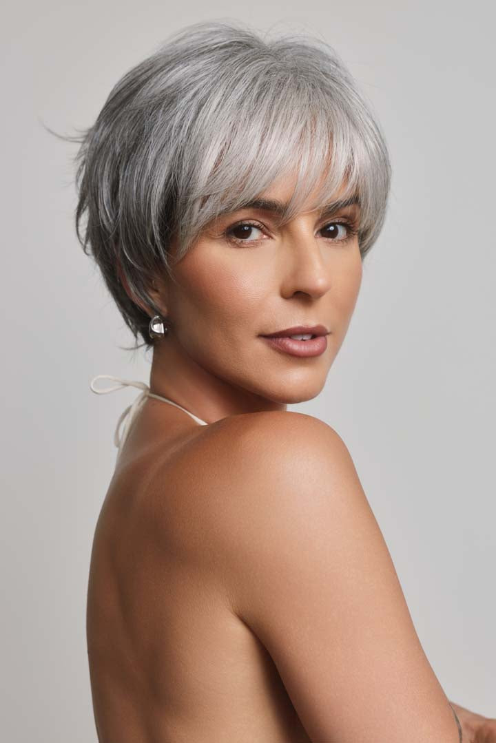 Mio by Noriko short, layered silver-grey synthetic pixie wig with a natural lace front and soft fringe.