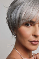 Mio by Noriko synthetic silver-grey short layered pixie wig with a natural lace front and side-swept fringe.