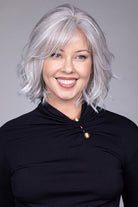 Woman wearing Naples wig by Belle Tress in Oyster Gray | Front smiling