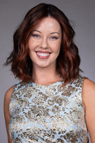Orchid by Belle Tress shoulder-length wavy bob wig with a center part and face-framing money piece highlights.