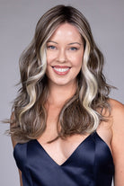 Poppy by Belle Tress mid-length wavy synthetic wig with a lace front, center part, and bright money piece highlights.