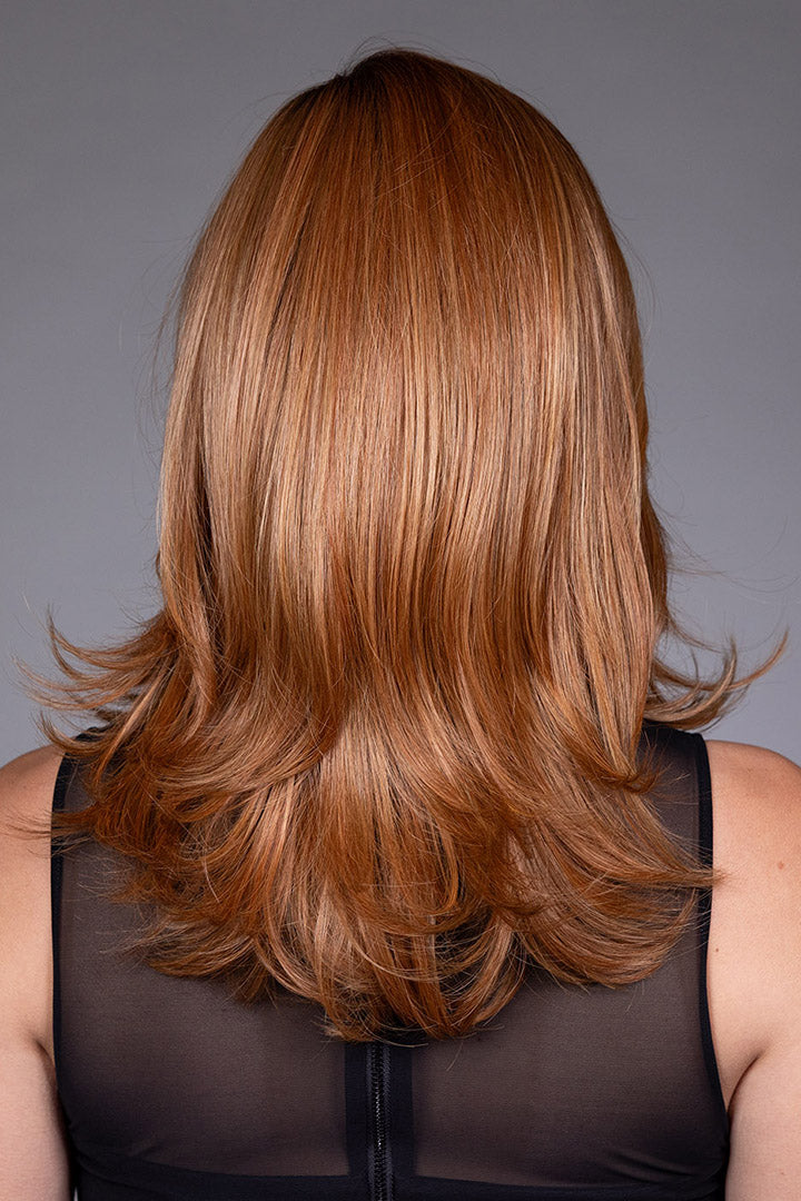 Woman wearing Prague wig by Belle Tress in Sienna Spice R | Back