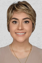 Woman with short blonde hair wearing PUSH Hair's Camille in color Shadow Champagne against a light background