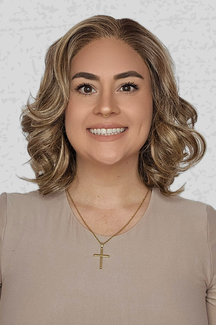 Woman wearing Lily by PUSH Hair in color Sunlit Almond R against a neutral background