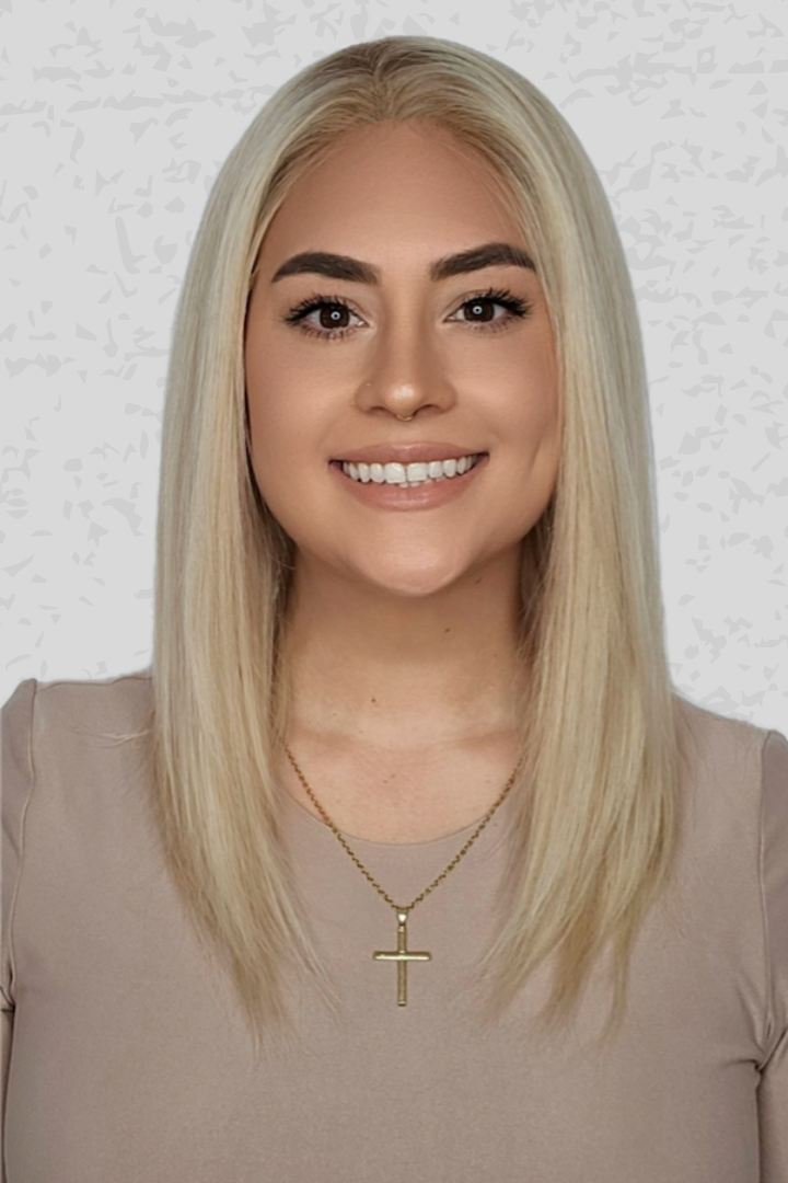 Woman wearing PUSH Hair's Sophia wig in color Glacial on a light background