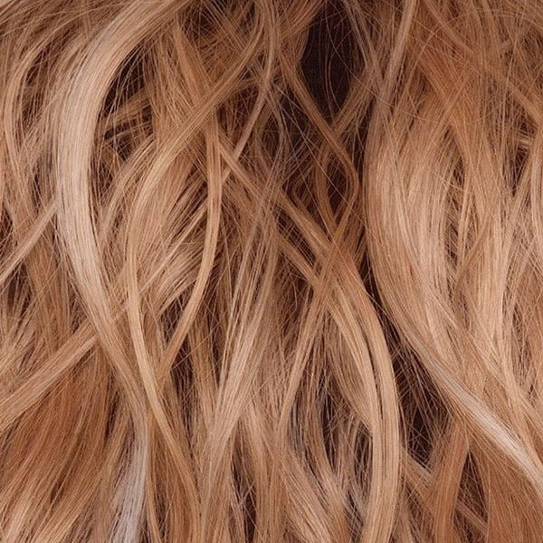 Peaches & Cream | A warm peach blonde base with creamy undertones and bright cream-white face-framing highlights. A rich chocolate root adds contrast, creating a vibrant, playful, yet sophisticated look.