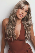 Phillipa synthetic lace front wig featuring long, wavy ash-blonde layers and face-framing fringe.