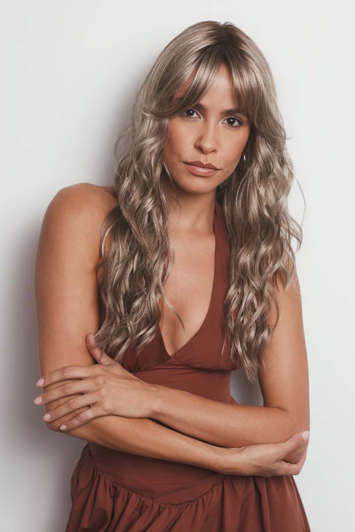 Phillipa synthetic lace front wig with long, wavy ash-blonde layers and face-framing fringe.