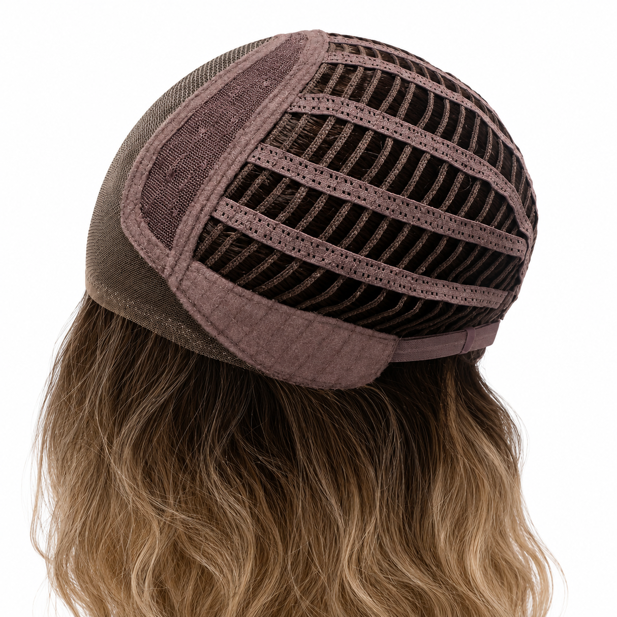Interior view of Phillipa synthetic wig showing the breathable cap construction and wavy blonde hair texture.
