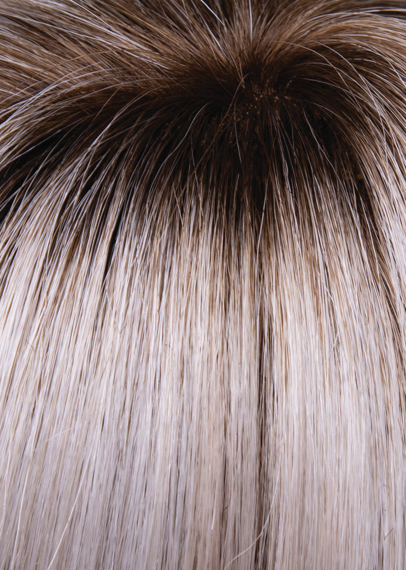 Close-up of a wig with brown and blonde hair