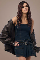 Woman in denim dress with Deep Plum Brown hair
