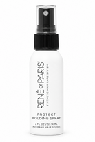 A white bottle of Rene or Paris Protect Holding Spray with a black spray nozzle, shown on a solid white background.