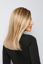 Raquel Welch shoulder-length blonde lob wig with a natural monofilament top and face-framing layers.