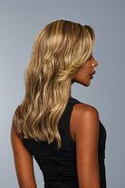 Woman is wearing Decadent Diva wig by Raquel Welch in color RL9/24SS | Right Side