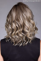 Model wearing Streep wig by Belle Tress in Sparkling Champagne Blonde R Back