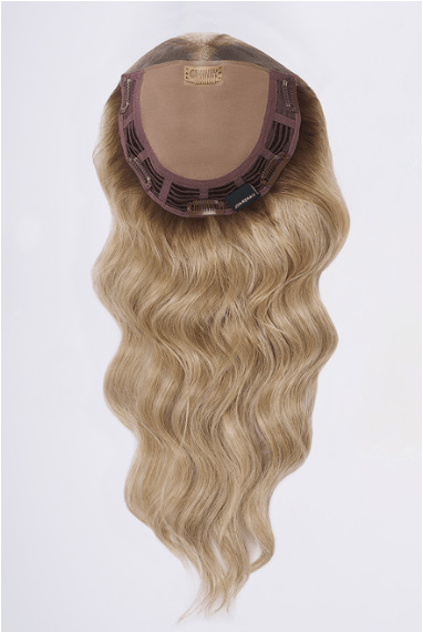 Hair topper with long wavy blonde hair, screenshot from January 2, 2026.