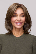 Mid-length layered synthetic wig by Jon Renau with a natural lace front in a highlighted brown shade.