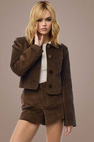 Woman in Smooth Wavez Bronzed Honey corduroy suit