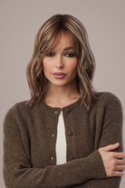 Smooth Wavez Snowy Umber wig on a woman