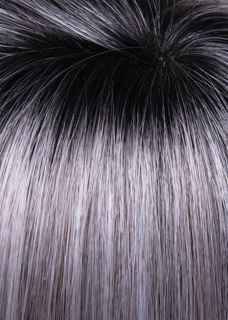 Close-up of black and gray hair strands
