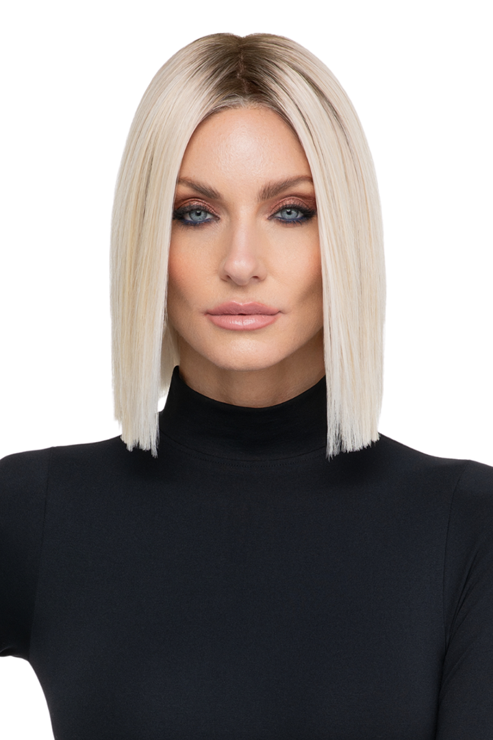 Still Iconic by TressAllure: A sleek, straight blonde bob wig with a center part and modern blunt-cut silhouette.