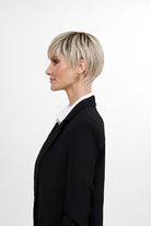 Woman wearing The Free Spirit wig by TressAllure in 613/1001/R18 | Left Side