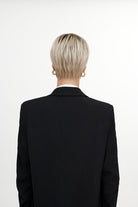 Woman wearing The Free Spirit wig by TressAllure in 613/1001/R18 | Back