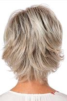 Model is wearing Easy Breezy wig by Toni Brattin in Platinum | Back